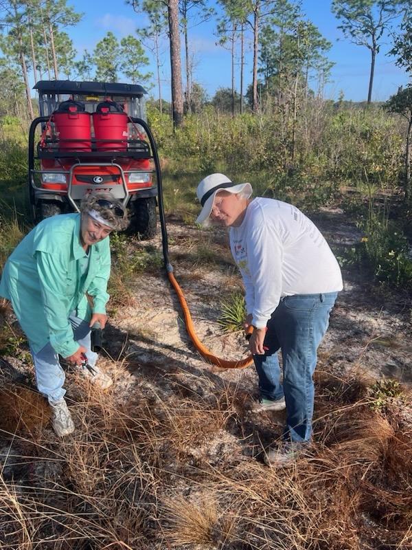 Linda and Sue Collecting Seed